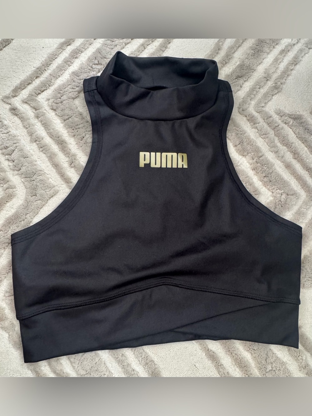 Puma Black High-Neck Cropped Sports Tank with Gold Logo
